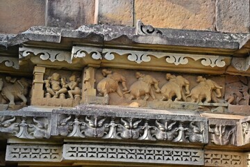 Elaborate and precise carvings in sculptures are intricate works of art created from a diverse range of materials, showcasing enchanting shapes and textures at khajuraho group of monuments, India 