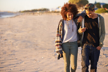 Couple, walking and conversation together on beach, sunset with gen z people on nature date in...