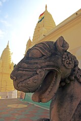 TIGER statue in a temple, symbolizing strength and wisdom. at Shantinatha, Khajuraho group of...