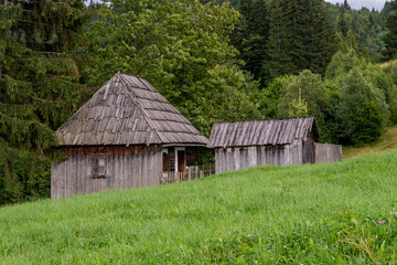 Fototapeta na wymiar Old Farm in the carpathians of Romania