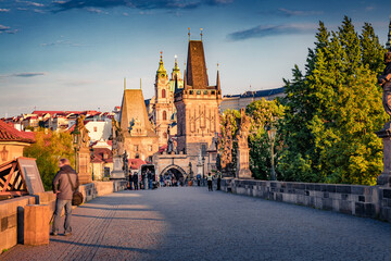 Impressive summer view of Charles bridge on Vltava river (Karluv Most) with statues and Prague castle. Marvelous morning cityscape of Prague, Czech Republic. Traveling concept background. - obrazy, fototapety, plakaty
