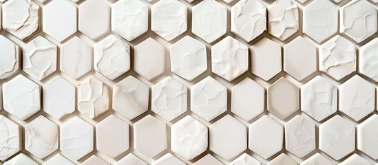 Tapeten A detailed shot of a white hexagon tile wall in a building, showcasing the intricate mesh pattern and sleek flooring design © 2rogan