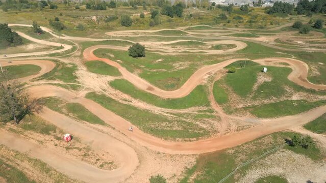Aerial view of riders on the motocross track.