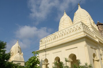 A serene Jain temple with intricate carvings and statues, radiating peace and spirituality. at...