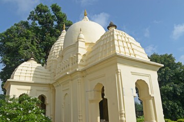 A serene Jain temple with intricate carvings and statues, radiating peace and spirituality. at...