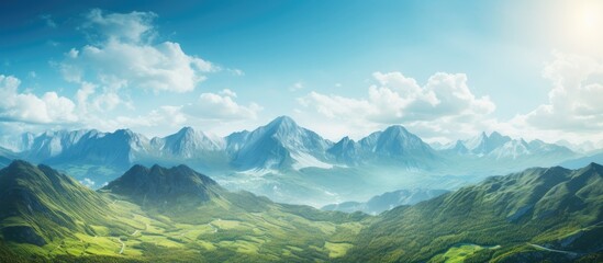 A panoramic view of a valley with a mountain range in the background - obrazy, fototapety, plakaty