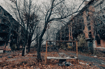 destroyed and burned houses in the city during the war in Ukraine