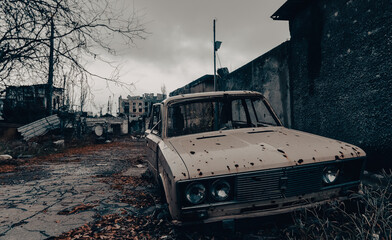 damaged and looted cars in a city in Ukraine during the war