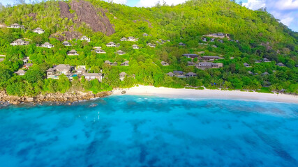 Fototapeta na wymiar Mahe Beach, Seychelles. Aerial view of tropical coastline on a sunny day