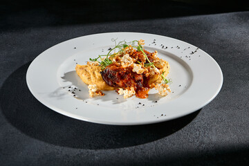 Beef medallions with vegetable puree, creatively served with a garnish, ideal for an upscale menu