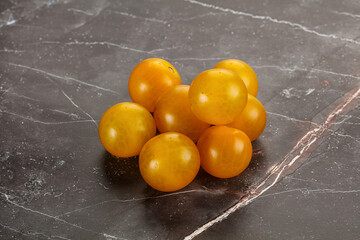 Ripe tasty yellow cherry tomato