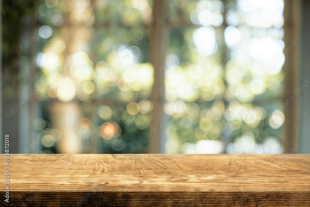 Poster Wooden table with bokeh lights and window background. Interior design template with copy space. High quality photo