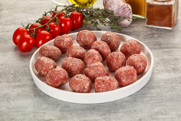Uncooked raw beef meatball minced