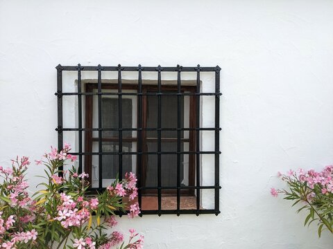 Typical Spanish window grille. bars of a window of a Spanish Mediterranean house.	