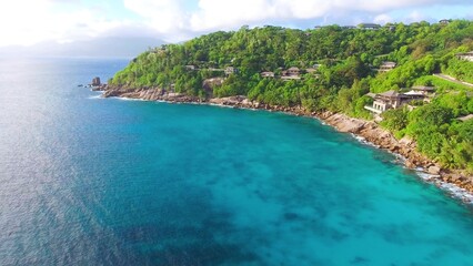 Fototapeta na wymiar Mahe Beach, Seychelles. Aerial view of tropical coastline on a sunny day