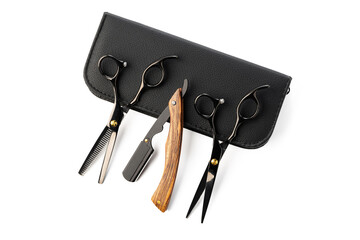 Hairdressing scissors with leather case on white background