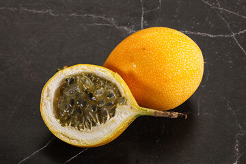 Yellow granadilla with cut half