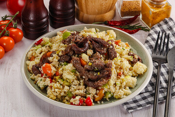 Traditional couscous with beef and vegetables