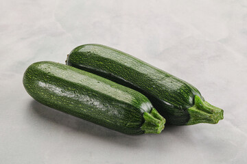 Raw green ripe zucchini vegetable