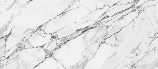Fotobehang A detailed closeup of a white marble texture, showcasing its intricate patterns and smooth surface. The marble resembles a snowy slope with its freezing cold appearance © 2rogan