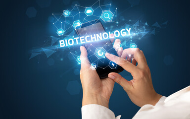 Hand using smartphone with technology concept