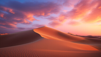 Desert under a vibrant sunset sky, capturing the serene and untouched beauty of the landscape