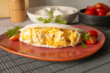 Tapioca Pancake with eggs Brazilian manioc food in front view