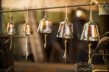 bells various sizes hanging in blacksmith studio