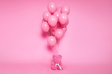 Set of Air Balloons. Bunch of pink color balloons and pink  teddy bear  isolated on pink background. Love. Holiday celebration. Valentine's Day party decoration.