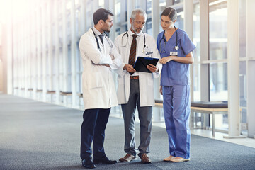 Doctors, expert and team in hospital with notes for diagnosis, discussion and health for medic and treatment. Young people or colleague with stethoscope for healthcare, medical and medicine on mockup