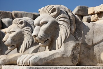A close-up of the detailed carvings on the Stone Lions of Delos, Greece.