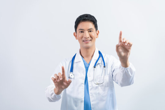 Attractive Middle aged asian male doctor pediatric, physical or psychiatrist in white coat with stethoscope standing isolated on white background, virus, health care, disease treatment