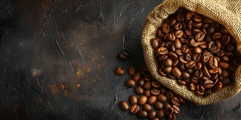 Tuinposter Freshly Roasted Coffee Beans in Burlap Sack with Ample Copy Space for Background or Text © Bussakon