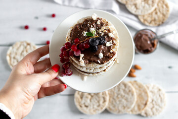 Rice cakes, healthy food.
on a wooden background. Breakfast