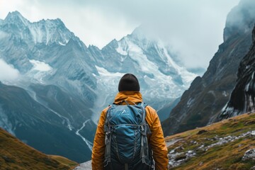 Unrecognizable person traveler, standing near the mountain