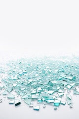 Shards of broken glass on a white background. Color illustration with space for text