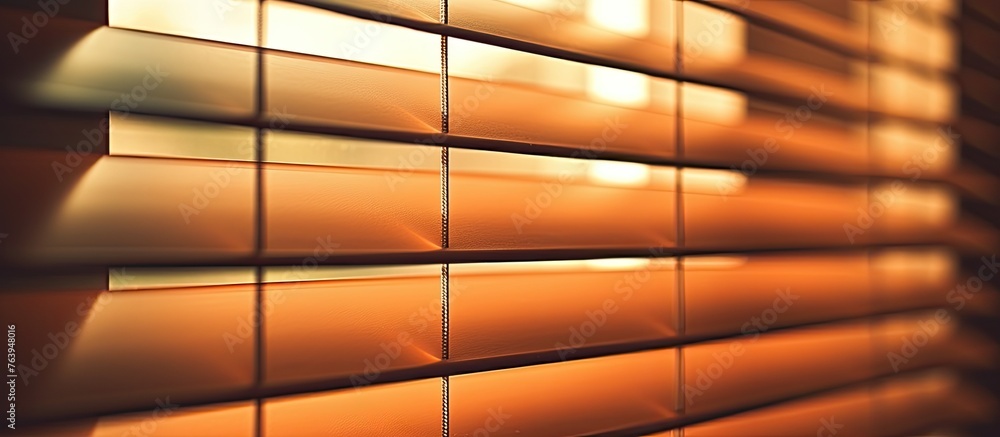 Poster a view of blinds in a room with soft light filtering through them