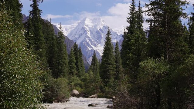 View of the high peak of the Tian Shan mountain range towards Boris Yeltsin Peak, Kyrgyzstan, near the Jeti Oguz Valley