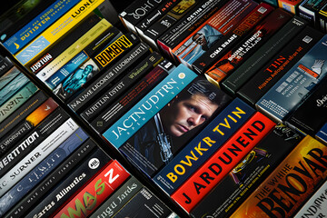 Thrilling Array of Robert Ludlum's Jason Bourne Series in a Stock Photo: Espionage and Action Galore - obrazy, fototapety, plakaty