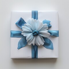 Top-View Minimalist White Gift Box with Blue Bow on Soft White Background

