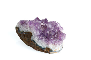 Amethyst mineral stone macro on white background