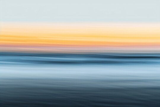 Abstract background with blurred sea waves and sky, long exposure