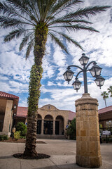 Clock Tower outside with blue skies, clouds, in historic downtown St. Augustine Visitor Center