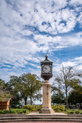 Clock Tower outside with blue skies, clouds, in historic downtown St. Augustine Visitor Center