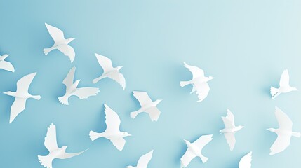 A series of paper cut out birds in flight forming a pattern across a sky-colored background