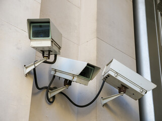 CCTV security cameras keeping watch outside building