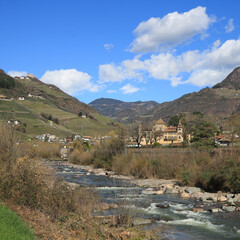 Fototapeta na wymiar Talfer, river in South Tirol and Runkelstein, old castle in Bolzano.