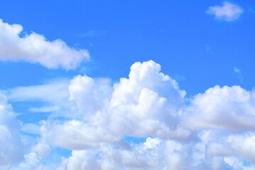 Tropical blue sky with white clouds background in summer season. Travel or holiday concept