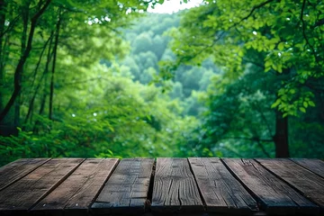 Fotobehang Empty table for product display montages in the forest, nature background © Cuong