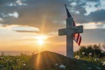 Obraz premium White cross on a hill with USA flag, sunset in the background, memorial day.
